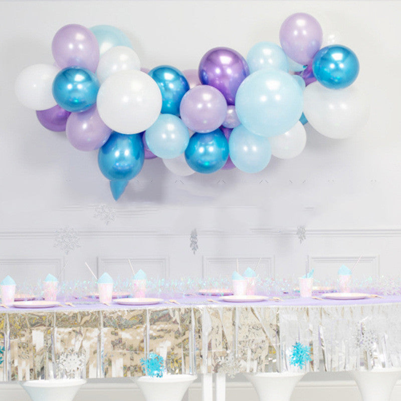 Festive Christmas-themed latex balloons in vibrant colors, perfect for holiday venue decoration.