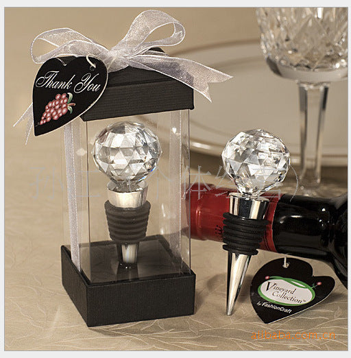 "Crystal Ball Wine Stopper – A stylish silver wine stopper made from metal with a beautiful crystal ball top, designed to keep your wine fresh while adding an elegant touch to your bottle."