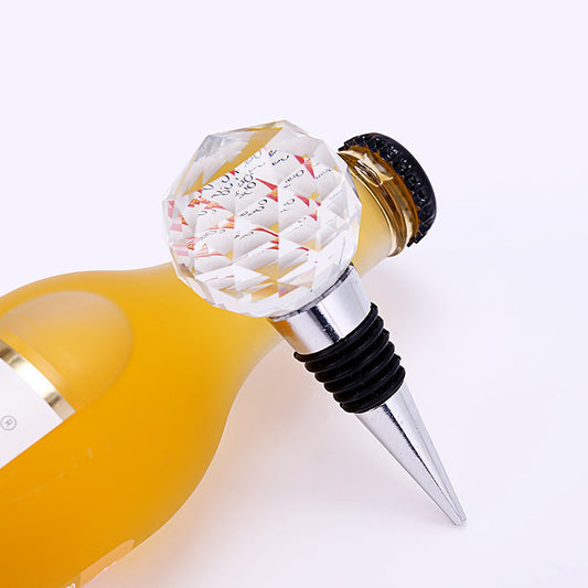 "Crystal Ball Wine Stopper – A stylish silver wine stopper made from metal with a beautiful crystal ball top, designed to keep your wine fresh while adding an elegant touch to your bottle."