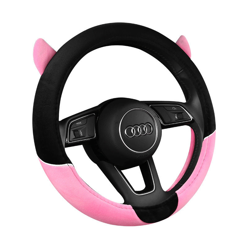 Cute cartoon plush steering wheel cover designed for all seasons, providing comfort and warmth. Fits most car models and adds a playful touch to your car's interior.