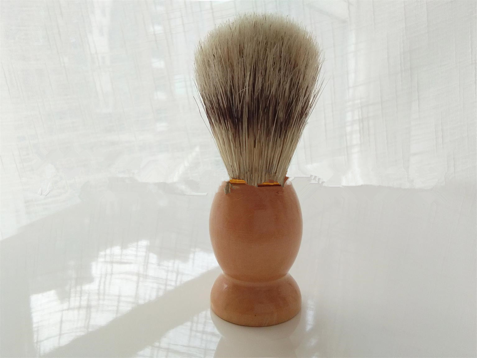 Men's shaving set featuring a metal brush and razor holder made of Fe-Ni alloy, a stainless steel double-layer shaving soap bowl, a 3-layer imported blade razor with a wooden handle, and a bristles shaving brush made from natural bristles. Available in two styles: one with a spare blade and another with two spare blades.