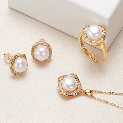 Elegant pearl necklace, ring, and earrings set in various color options, featuring timeless designs and luxurious craftsmanship