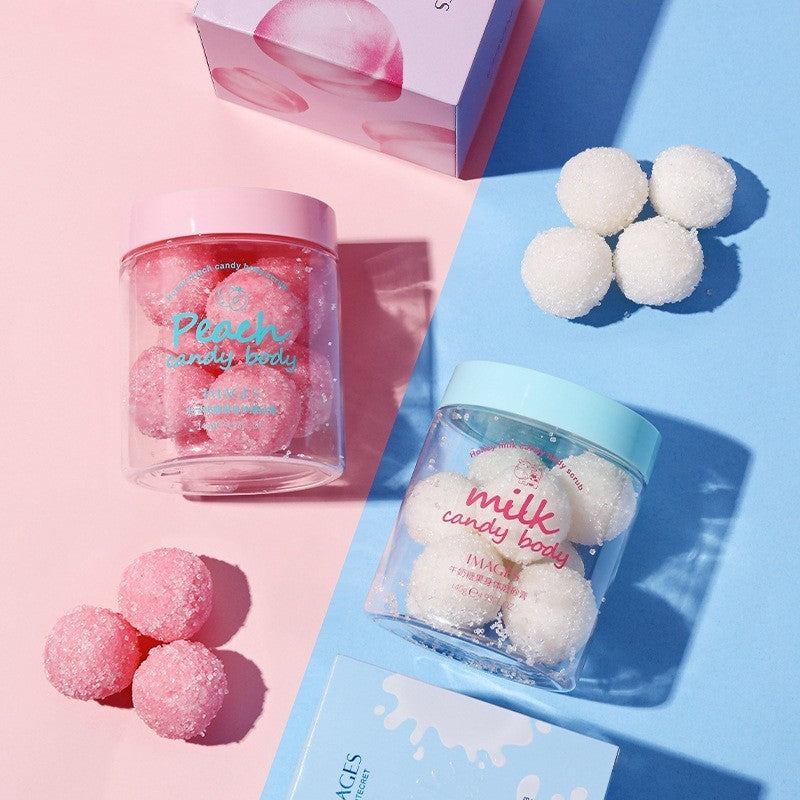 **Peach Candy Body Scrub** – A **silky, exfoliating scrub** that gently removes **dirt, oil, and dead skin** while hydrating and smoothing. With a **candy-frosted texture**, it dissolves effortlessly for a soft, radiant glow. 🍑✨ **140g per bottle.**