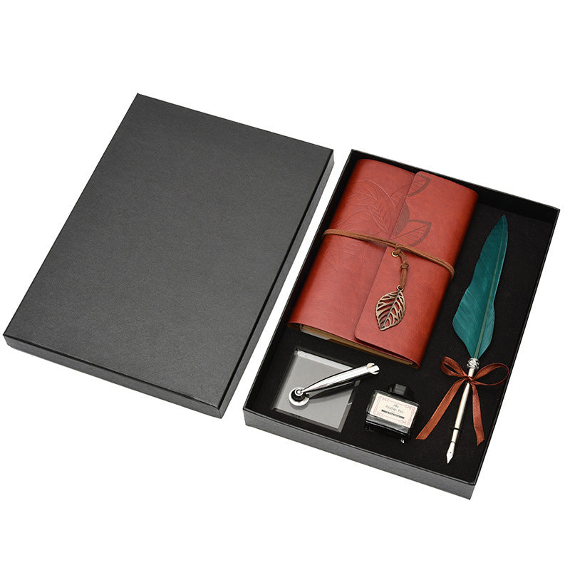 **Feather Dip Pen Gift Set – Vintage Elegance ✒️** A stunning **copper pen** with a **natural feather dip pen**, complete with **ink bottle**, **acrylic base pen insert**, and **antique book**. Box size: **25.7 x 20.7 x 5.5cm**. Perfect for writers and those who appreciate a touch of **retro charm**. ✨