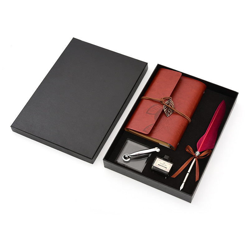 **Feather Dip Pen Gift Set – Vintage Elegance ✒️** A stunning **copper pen** with a **natural feather dip pen**, complete with **ink bottle**, **acrylic base pen insert**, and **antique book**. Box size: **25.7 x 20.7 x 5.5cm**. Perfect for writers and those who appreciate a touch of **retro charm**. ✨