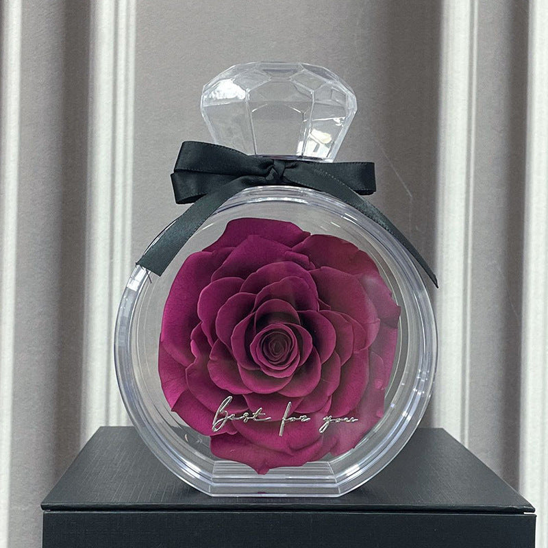 **Rose Gift Box Home Decor – Elegant & Charming 🌹** A stylish **dried flower** arrangement in a **plastic bottle**, available in colors like **Red**, **Pink**, **Sapphire Blue**, and more. Perfect for **Valentine's Day**, **Mother's Day**, and other special occasions. **10x6x14cm**. 🎁
