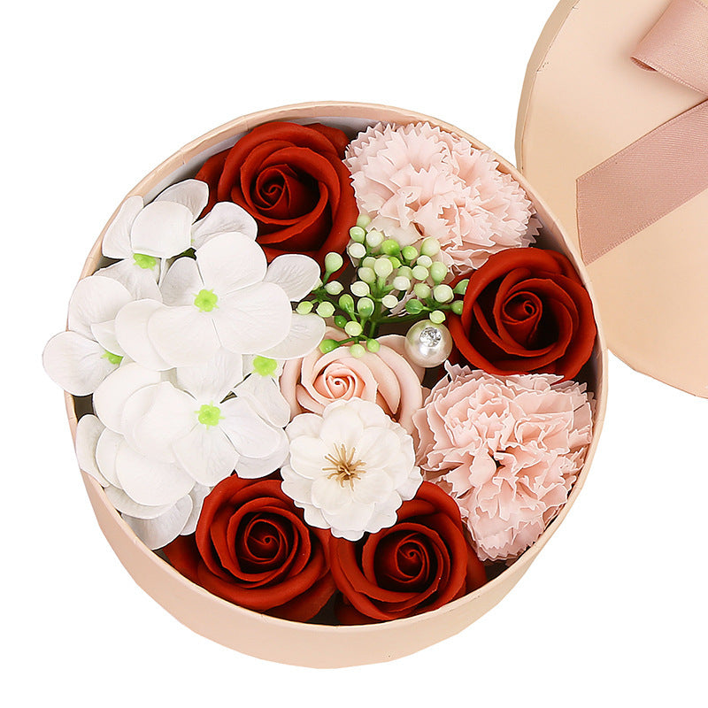 Delight your loved ones with the Soap Flower Gift Box, a beautifully handcrafted bouquet of delicate soap roses presented in a stylish gift box. Perfect for any occasion, this exquisite arrangement combines elegance with a soft, refreshing fragrance, making it a luxurious and meaningful gift.