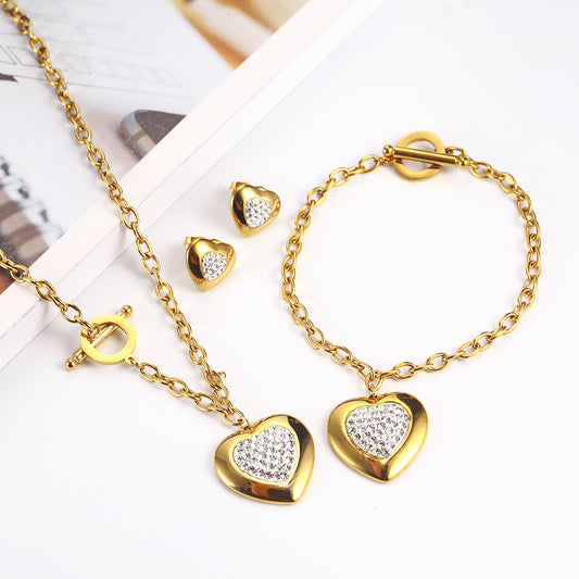 Heart-Shaped Rhinestone Jewelry Set made of titanium steel, featuring a necklace (45cm) and bracelet (20cm) with manual polishing. Available in steel color and gold.