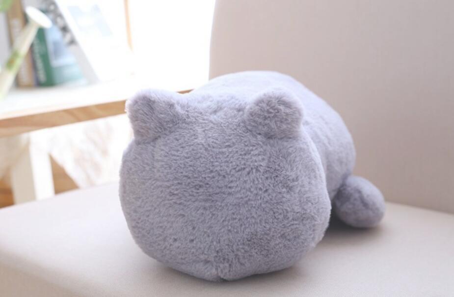 "Cat Plush Doll – A soft and cuddly stuffed animal featuring a pure color back cat design, made with high-quality plush and soft cotton, measuring 33cm. Perfect for room decoration or as a gift for loved ones."