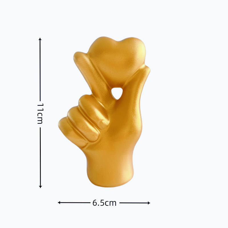 **Love Gesture Resin Ornament** – A beautifully crafted **resin decor piece** symbolizing love and warmth. Available in **red, gold, silver, and white**, it’s compact (**11 × 6.5 × 4 cm**) and perfect for any space. Ideal as a **gift or home accent**. 💖