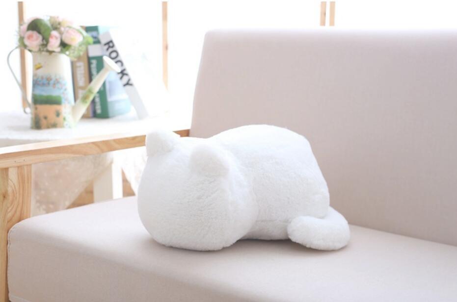 "Cat Plush Doll – A soft and cuddly stuffed animal featuring a pure color back cat design, made with high-quality plush and soft cotton, measuring 33cm. Perfect for room decoration or as a gift for loved ones."