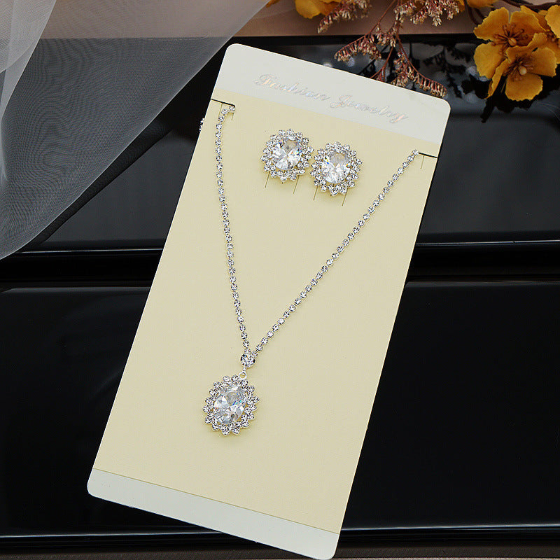 Water Drop Necklace and Earrings Set – Elegant alloy set featuring rhinestone pendant and gold-plated artificial gems. Perfect for weddings, travel souvenirs, and special gifts