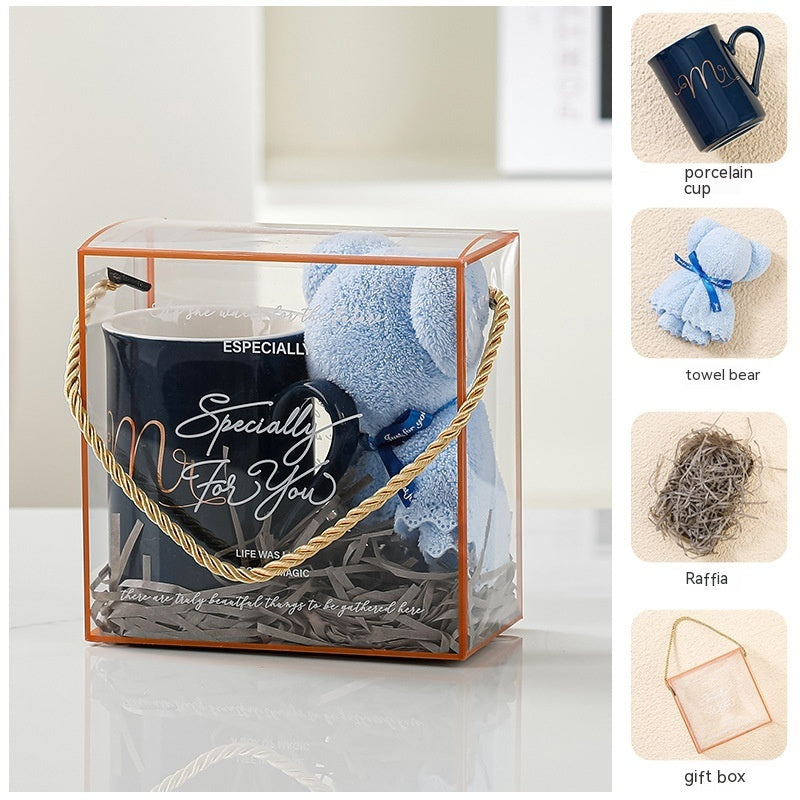 Home Creative Companion Gift Set – Elegant ceramic cup, towel bear, raffles, and gift box in light luxury pink, blue, and letter designs. Perfect for gifting!