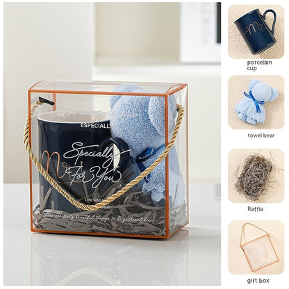 Home Creative Companion Gift Set – Elegant ceramic cup, towel bear, raffles, and gift box in light luxury pink, blue, and letter designs. Perfect for gifting!