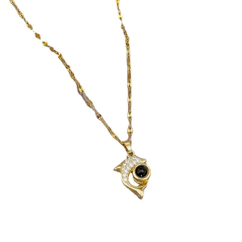 Exquisite dolphin stone necklace, featuring a unique and elegant design. Perfect for adding exotic charm to any outfit.