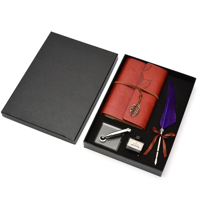 **Feather Dip Pen Gift Set – Vintage Elegance ✒️** A stunning **copper pen** with a **natural feather dip pen**, complete with **ink bottle**, **acrylic base pen insert**, and **antique book**. Box size: **25.7 x 20.7 x 5.5cm**. Perfect for writers and those who appreciate a touch of **retro charm**. ✨