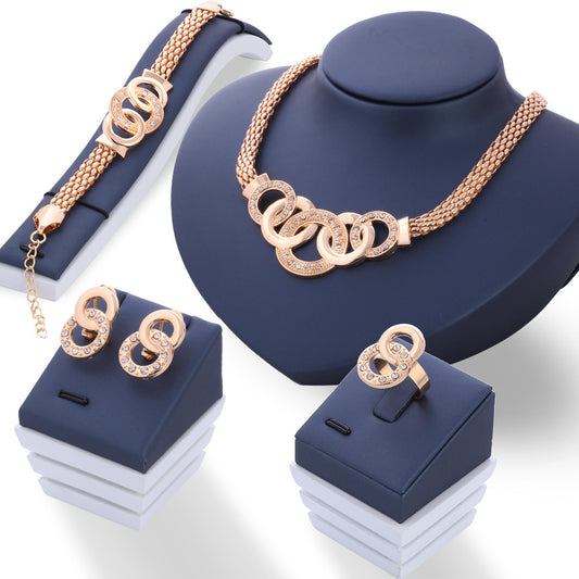 4-piece couple-style jewelry gift set featuring rhinestone earrings, hand accessories, and item accessories with alloy inlaid artificial gems and semi-precious stones. Includes a stylish horsewhip chain.