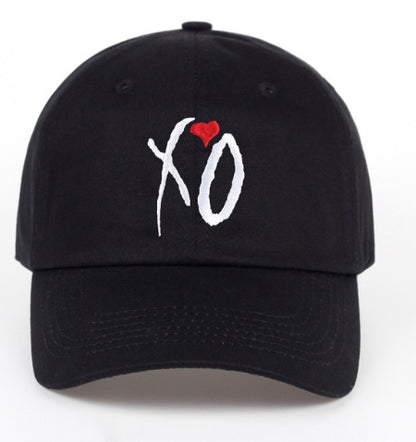 Add a touch of fun and flair to your everyday look with the Embroidered Love XO Baseball Cap. Featuring playful and stylish embroidery, this cap is the perfect blend of casual comfort and street-style fashion.
