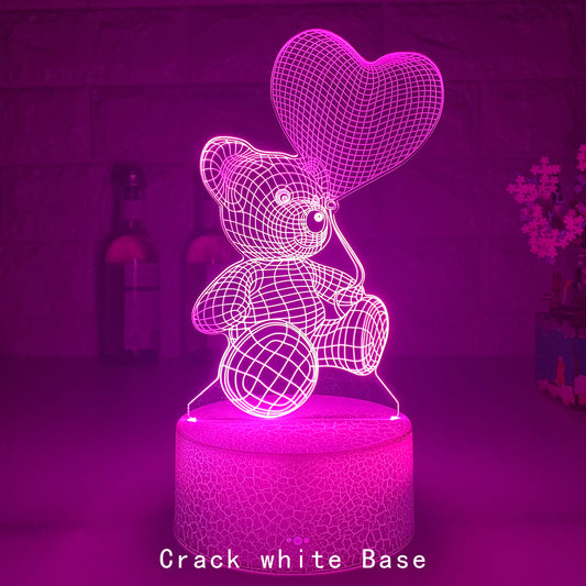 
3D Teddy Bear LED Night Light with 16 color options, touch and remote control, made from acrylic material. Powered by USB or batteries, perfect for kids' room decor.