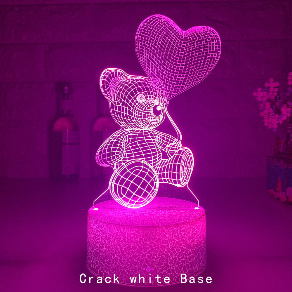 
3D Teddy Bear LED Night Light with 16 color options, touch and remote control, made from acrylic material. Powered by USB or batteries, perfect for kids' room decor.