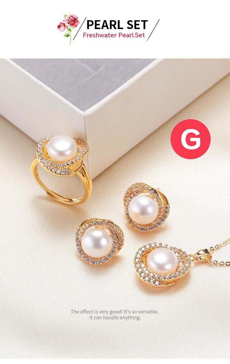 Elegant pearl necklace, ring, and earrings set in various color options, featuring timeless designs and luxurious craftsmanship