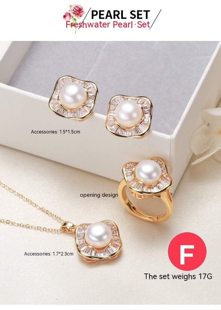Elegant pearl necklace, ring, and earrings set in various color options, featuring timeless designs and luxurious craftsmanship