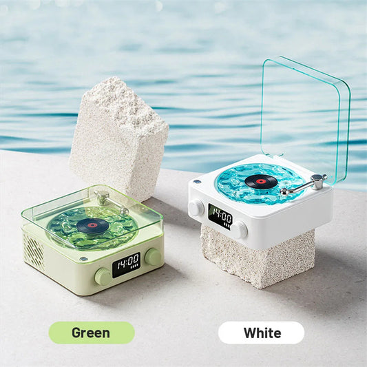 **Retro Turntable Bluetooth Speaker – Vintage Style, Modern Sound 🎶** A portable Bluetooth speaker (142x153x67mm) with a retro design, offering 4 soothing nature sounds like ocean waves and birds. Features 360° surround sound, multiple playback options (Bluetooth, AUX, TF card), and a beautiful breathing light with a transparent turntable. Perfect for parties, relaxation, or enhancing your bedroom ambiance. Available in **blue** and **green**. 🎵
