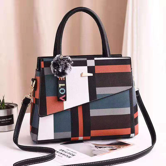 Stylish ladies one shoulder bag in two sizes (small and large), featuring a sleek design with a portable handle. Perfect for carrying essentials with a modern, elegant touch.