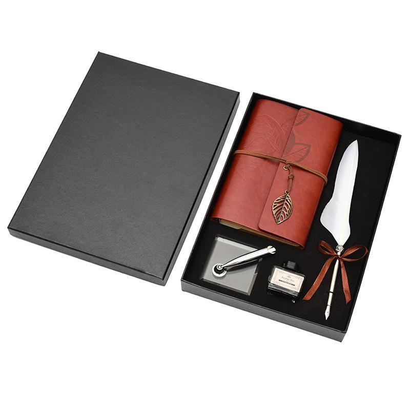 **Feather Dip Pen Gift Set – Vintage Elegance ✒️** A stunning **copper pen** with a **natural feather dip pen**, complete with **ink bottle**, **acrylic base pen insert**, and **antique book**. Box size: **25.7 x 20.7 x 5.5cm**. Perfect for writers and those who appreciate a touch of **retro charm**. ✨