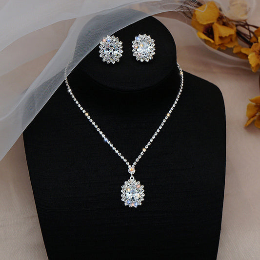 Water Drop Necklace and Earrings Set – Elegant alloy set featuring rhinestone pendant and gold-plated artificial gems. Perfect for weddings, travel souvenirs, and special gifts