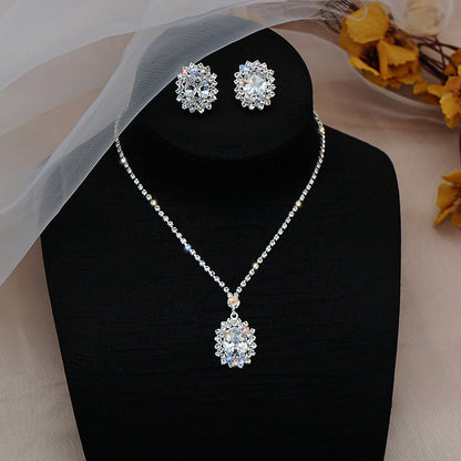 Water Drop Necklace and Earrings Set – Elegant alloy set featuring rhinestone pendant and gold-plated artificial gems. Perfect for weddings, travel souvenirs, and special gifts