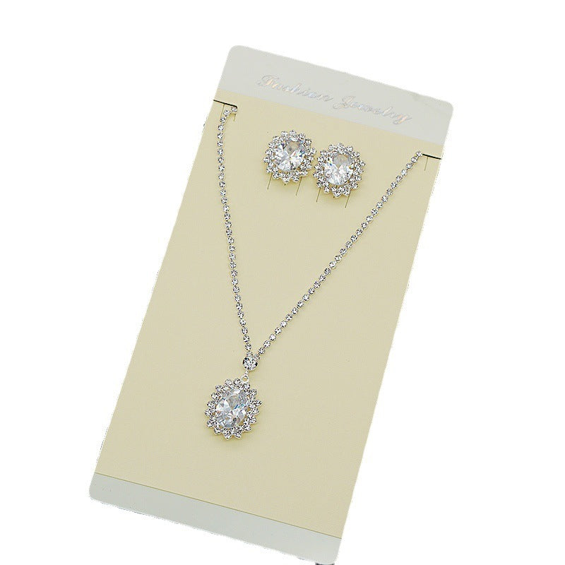 Water Drop Necklace and Earrings Set – Elegant alloy set featuring rhinestone pendant and gold-plated artificial gems. Perfect for weddings, travel souvenirs, and special gifts
