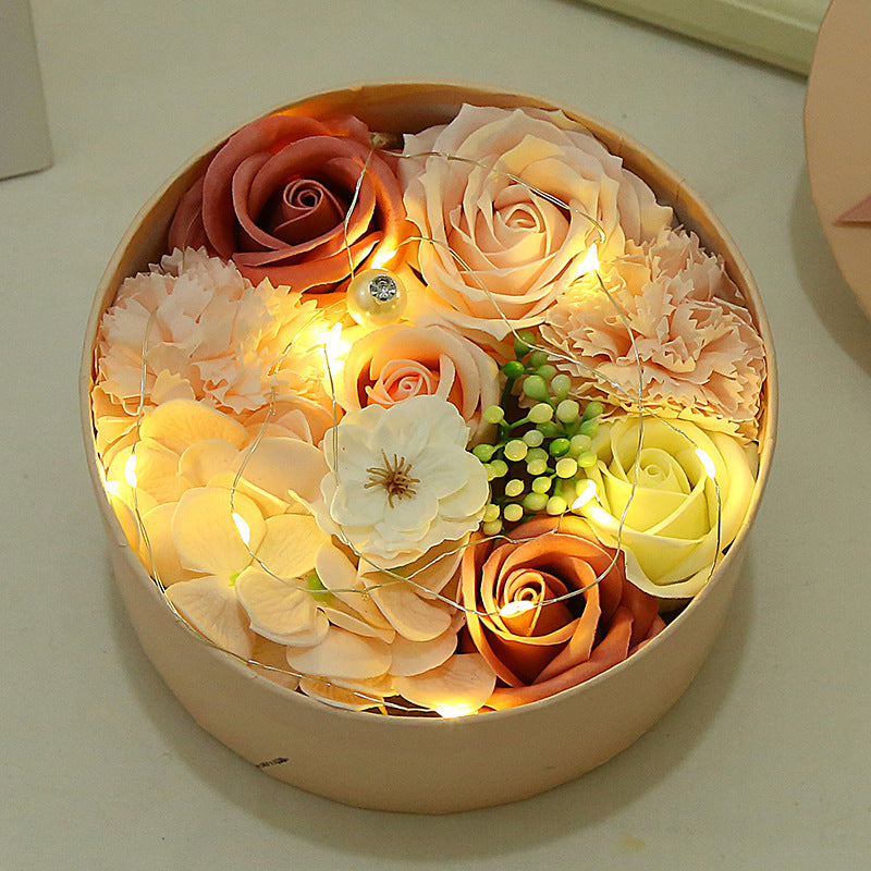 Delight your loved ones with the Soap Flower Gift Box, a beautifully handcrafted bouquet of delicate soap roses presented in a stylish gift box. Perfect for any occasion, this exquisite arrangement combines elegance with a soft, refreshing fragrance, making it a luxurious and meaningful gift.