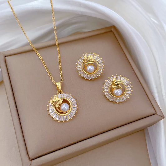 Diamond Leaves Jewelry Set – Elegant geometric necklace and earrings set featuring titanium steel and copper, with electroplating for durability and a sophisticated design.