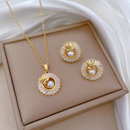 Diamond Leaves Jewelry Set – Elegant geometric necklace and earrings set featuring titanium steel and copper, with electroplating for durability and a sophisticated design.
