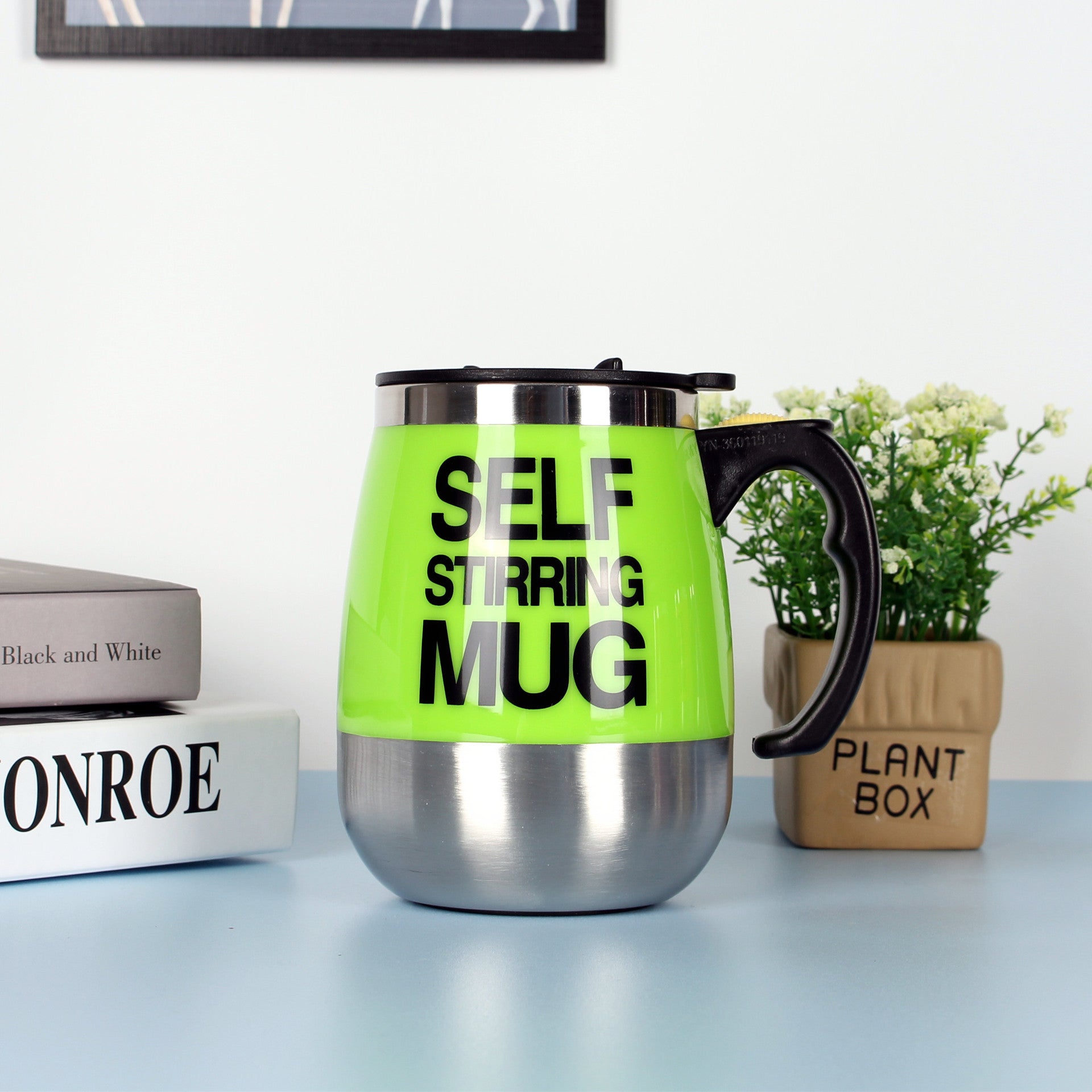 "Electric Self-Stirring Coffee Mug – A convenient, one-touch self-mixing mug with a 401-500ml capacity, available in multiple vibrant colors. Perfect for coffee, tea, and hot chocolate lovers at home or on the go."