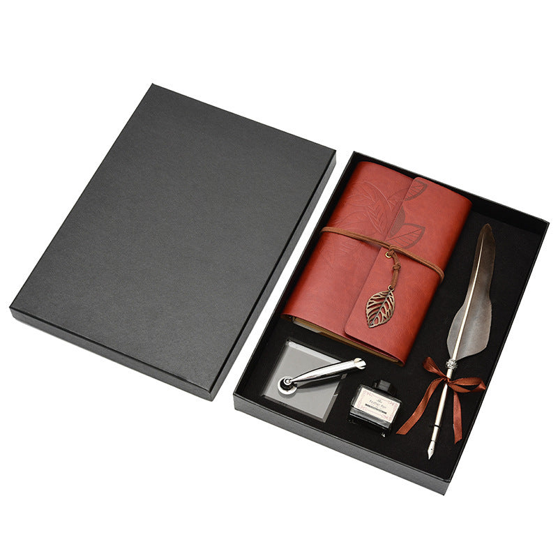 **Feather Dip Pen Gift Set – Vintage Elegance ✒️** A stunning **copper pen** with a **natural feather dip pen**, complete with **ink bottle**, **acrylic base pen insert**, and **antique book**. Box size: **25.7 x 20.7 x 5.5cm**. Perfect for writers and those who appreciate a touch of **retro charm**. ✨