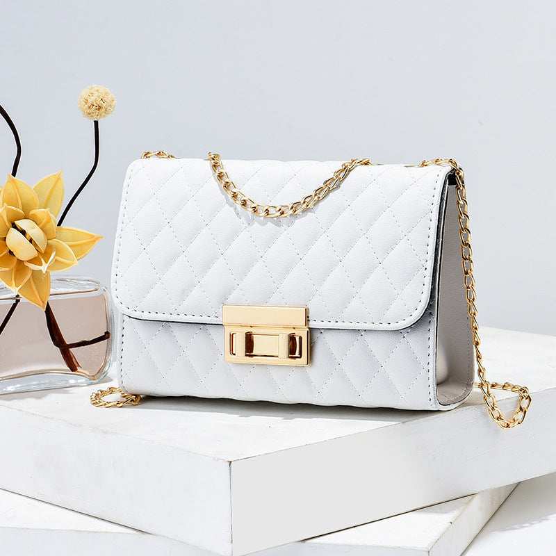 Luxury mini women handbag, offering fashionable elegance and versatile charm for every occasion. #MiniHandbag #LuxuryAccessories #FashionableElegance #ChicStyle #VersatileCharm #DesignerBag #StylishPurse #WomenFashion