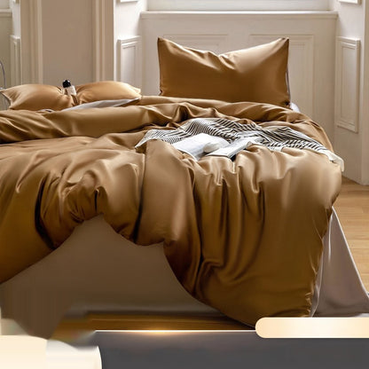 Luxuriously soft Four-Piece Ice Silk Bed Sheets made from breathable Lyocell fiber (Tencel). Features a modern minimalist design, reactive dyeing for long-lasting color, and a silky-smooth texture for year-round comfort. Available in multiple sizes.