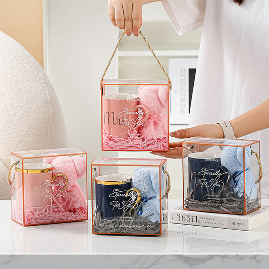 Home Creative Companion Gift Set – Elegant ceramic cup, towel bear, raffles, and gift box in light luxury pink, blue, and letter designs. Perfect for gifting!