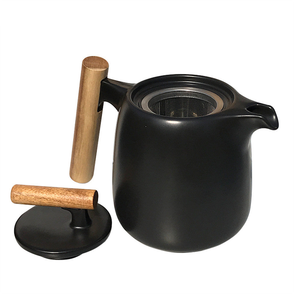 Elegant black porcelain pastoral style portable tea set, featuring an 8-piece set with a small and fresh design, perfect for outdoor tea experiences.