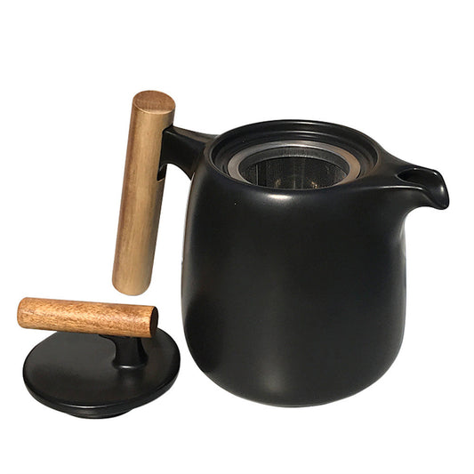 Elegant black porcelain pastoral style portable tea set, featuring an 8-piece set with a small and fresh design, perfect for outdoor tea experiences.