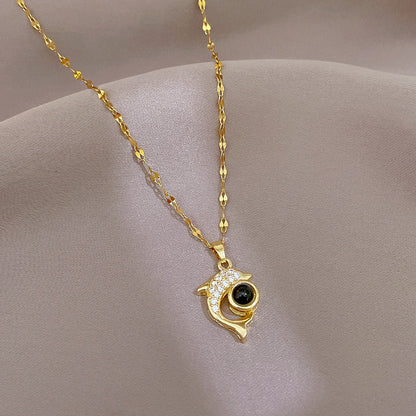 Exquisite dolphin stone necklace, featuring a unique and elegant design. Perfect for adding exotic charm to any outfit.