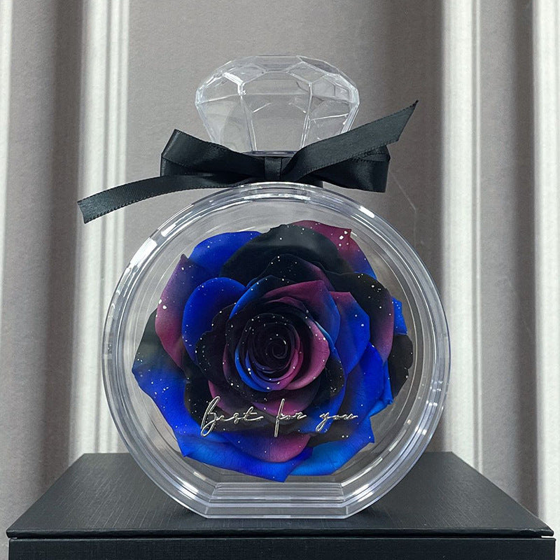 **Rose Gift Box Home Decor – Elegant & Charming 🌹** A stylish **dried flower** arrangement in a **plastic bottle**, available in colors like **Red**, **Pink**, **Sapphire Blue**, and more. Perfect for **Valentine's Day**, **Mother's Day**, and other special occasions. **10x6x14cm**. 🎁