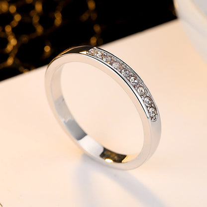 Elegant set of geometric copper rings adorned with sparkling zircon stones, offering a perfect blend of modern style and timeless sophistication.