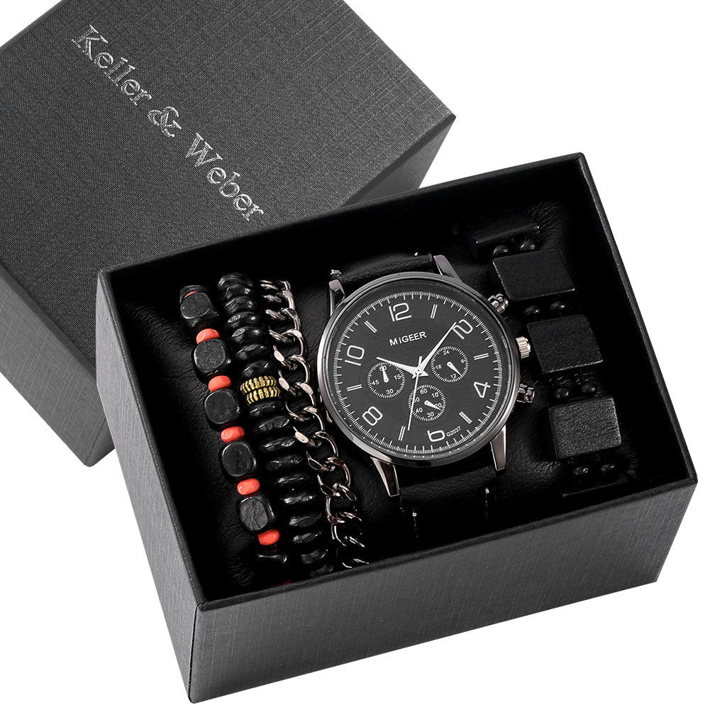 A stylish men's gift box set featuring a quartz watch with a leather strap and three matching bracelets. Perfect for any occasion.