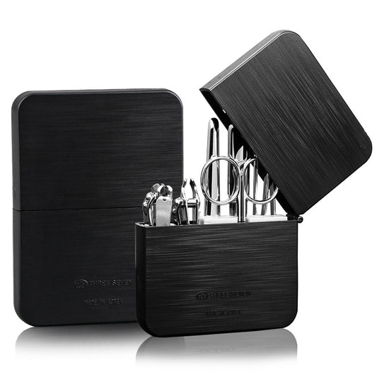 Nail clippers set made of carbon steel, including a diagonal cut clipper, flat cut clipper, dead skin shovel, nail file, eyebrow clip, ear pick, and eyebrow scissors for complete grooming.