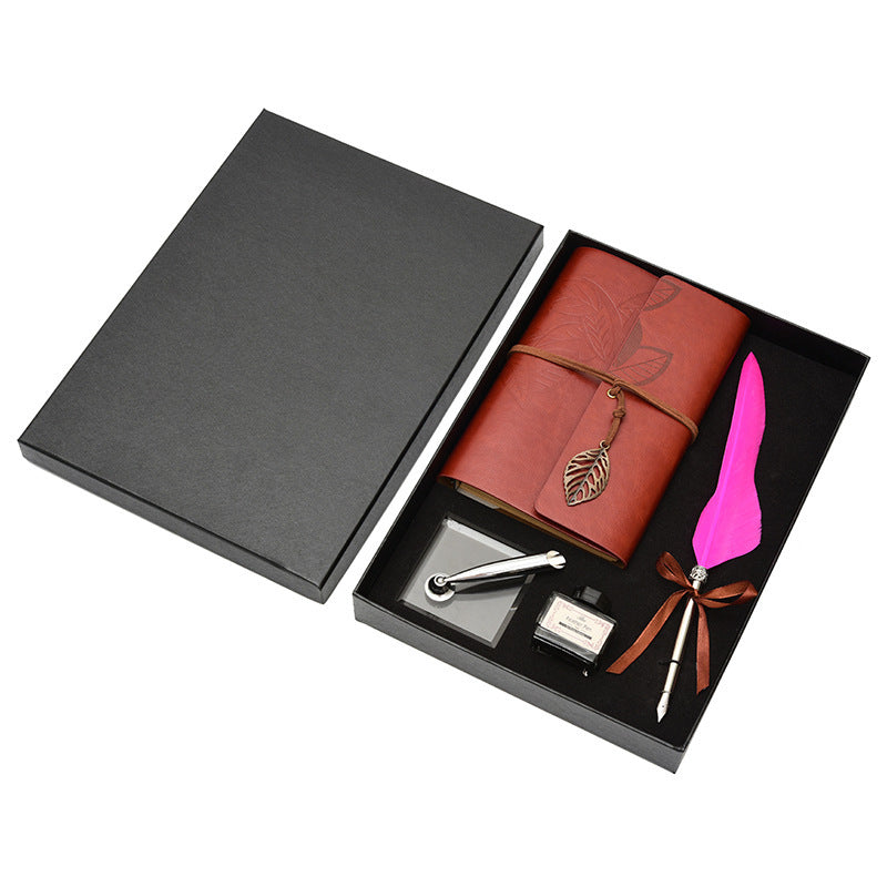**Feather Dip Pen Gift Set – Vintage Elegance ✒️** A stunning **copper pen** with a **natural feather dip pen**, complete with **ink bottle**, **acrylic base pen insert**, and **antique book**. Box size: **25.7 x 20.7 x 5.5cm**. Perfect for writers and those who appreciate a touch of **retro charm**. ✨