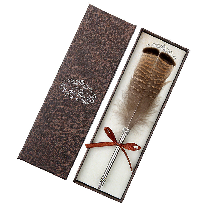 **Elegant Retro Feather Pen Gift Set – Vintage Writing Experience**  

A beautifully crafted **stainless steel feather pen** set in a stylish **gift box**, perfect for writers, calligraphy enthusiasts, and collectors. Timeless design meets smooth writing for an unforgettable experience. Ideal for gifting on any occasion! 🎁✒️