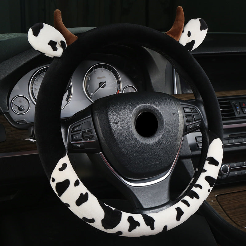 Plush cute car steering wheel cover made from soft short plush material, providing a comfortable and breathable grip. Fits most steering wheels with a 38cm diameter, suitable for all seasons.